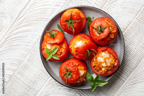 Canvastavla Baked stuffed tomatoes with rice and cheese