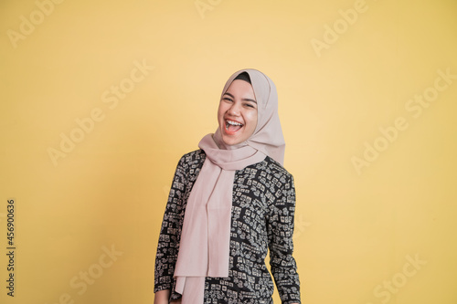 asian muslim woman wearing hijab with happy expression