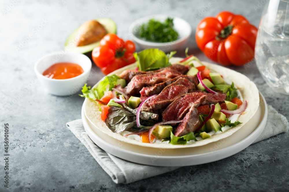 Beef steak fajitas with avocado and onion Beef steak fajitas with avocado and onion