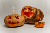 carved pumpkin faces for halloween with candles