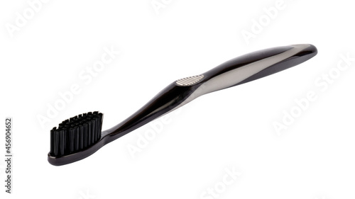 toothbrush isolated on white background. black brush close up