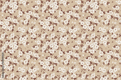 Vintage floral background. Floral pattern with small white flowers on a light beige background. Seamless pattern for design and fashion prints. Ditsy style. Stock vector illustration.