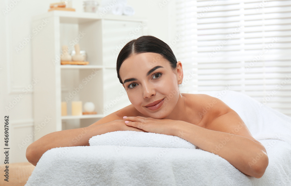Beautiful young woman relaxing in spa salon Beautiful young woman relaxing in spa salon