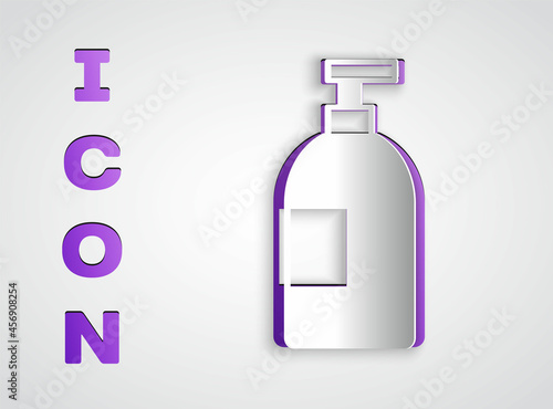 Paper cut Dishwashing liquid bottle icon isolated on grey background. Liquid detergent for washing dishes. Paper art style. Vector