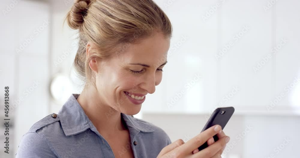 Real woman using mobile phone at home drinking coffee enjoying relaxing lifestyle Real woman using mobile phone at home drinking coffee enjoying relaxing lifestyle