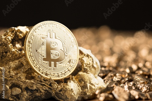 Cryptocurrency coins with gold nuggets. Investment and store of value concept. photo