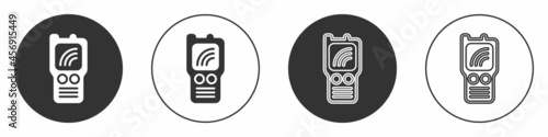 Black Walkie talkie icon isolated on white background. Portable radio transmitter icon. Radio transceiver sign. Circle button. Vector