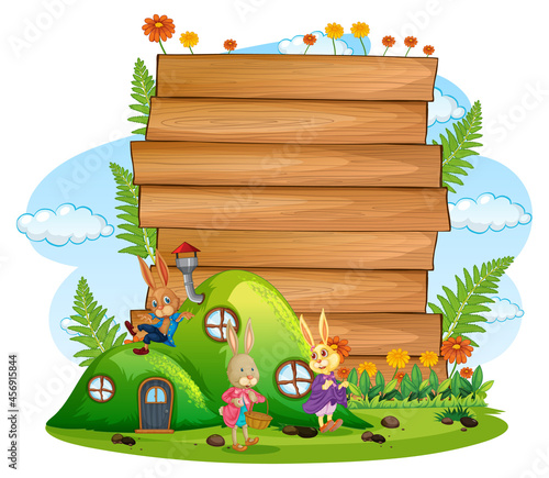 Blank banner in the garden with rabbit family isolated
