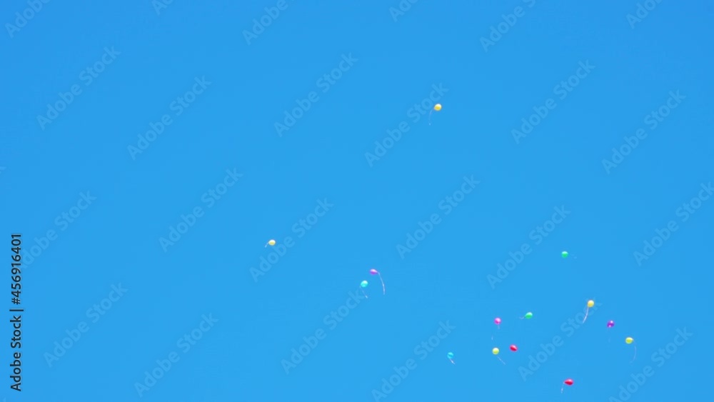 Colourful balloons flying in the blue sky Colourful balloons flying in the blue sky