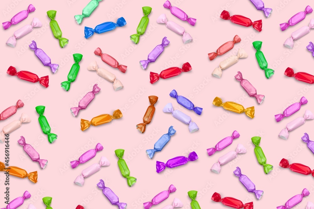 Rainbow juicy gummy candies. Pattern from jelly sweets on background Rainbow juicy gummy candies. Pattern from jelly sweets on background