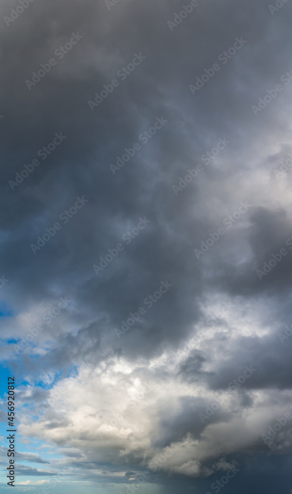 Fototapeta premium Fantastic thunderclouds, vertical panorama