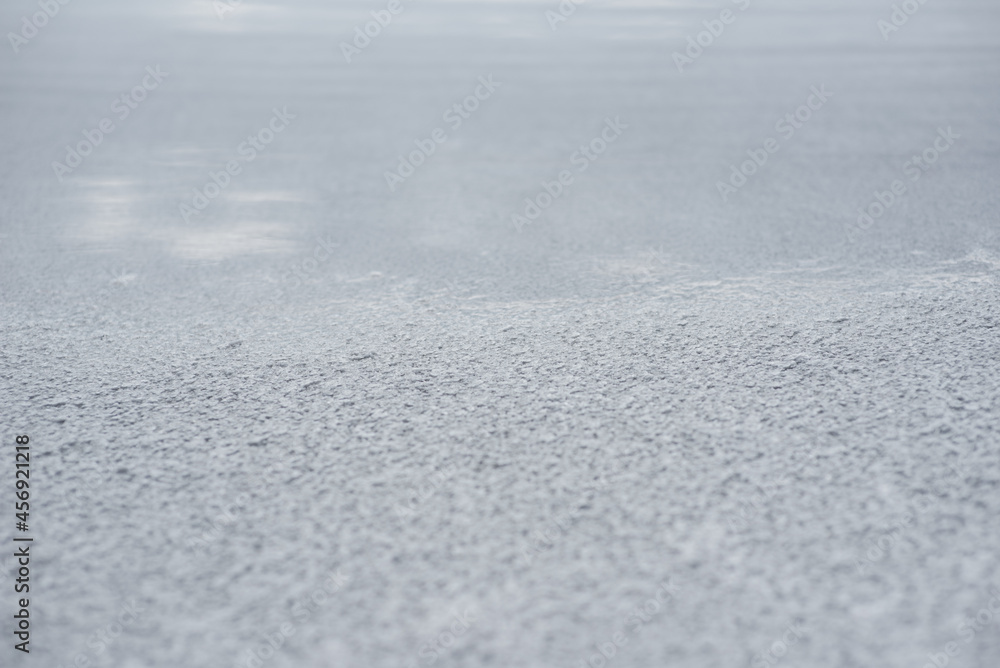 Close up of a dried, crystallised, cracked, natural white salt lake bed on a sunny day. Close up of a dried, crystallised, cracked, natural white salt lake bed on a sunny day.