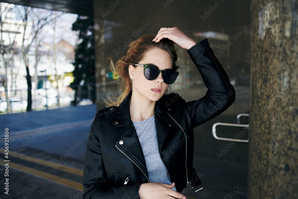woman in leather jacket outdoors walk fresh air fashion woman in leather jacket outdoors walk fresh air fashion