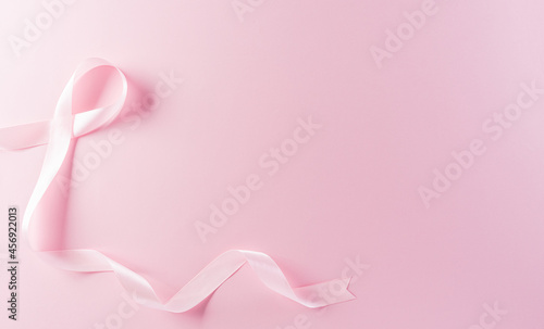 Pink ribbons on pastel background, Symbol of women's breast cancer awareness, Health care and medical concept.
