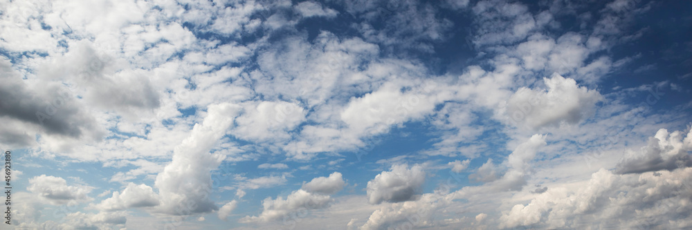 Panorama of beautiful blue sky with lots of clouds in the daytime Panorama of beautiful blue sky with lots of clouds in the daytime