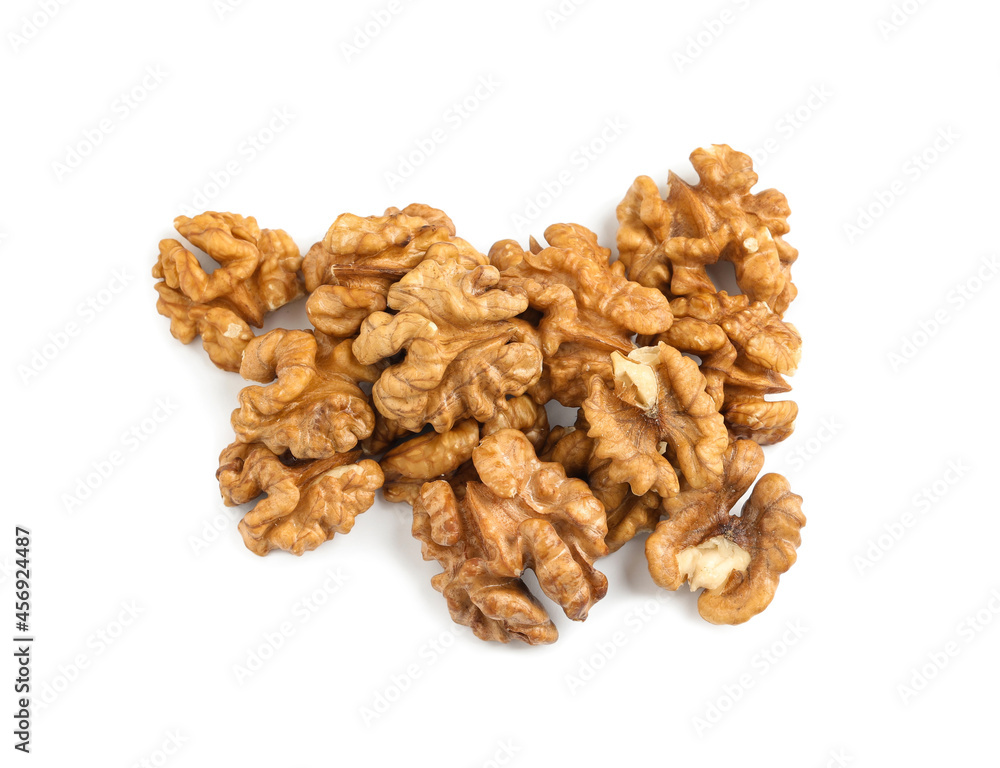 Pile of peeled walnuts on white background, top view Pile of peeled walnuts on white background, top view