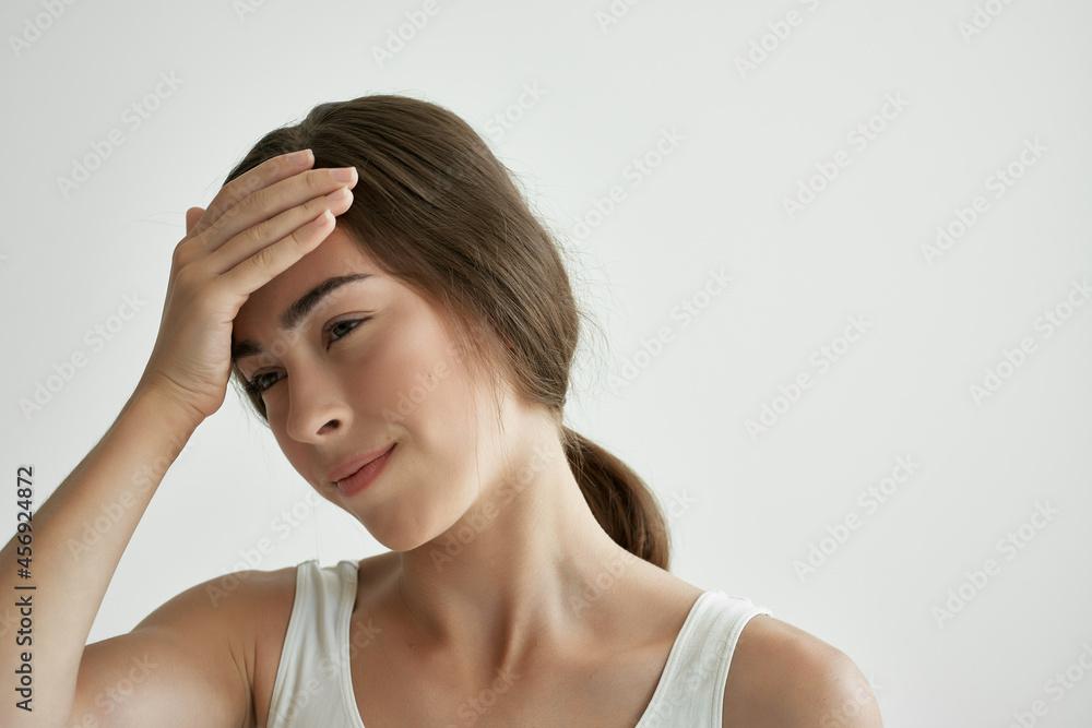 woman holding her head migraine health problems depression dissatisfaction woman holding her head migraine health problems depression dissatisfaction