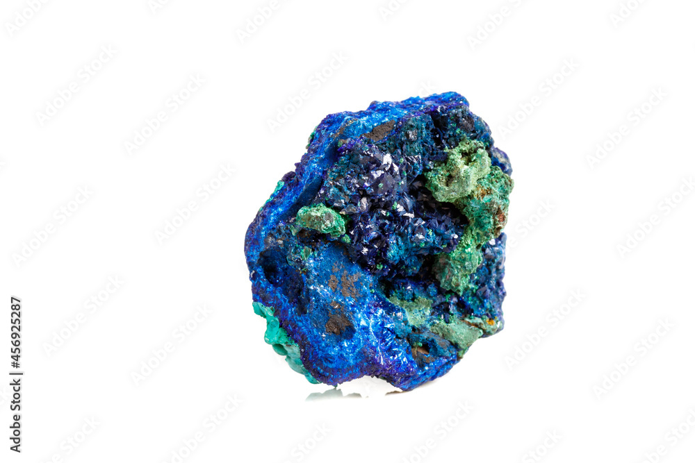 Macro mineral stone malachite with azurite on white background Macro mineral stone malachite with azurite on white background