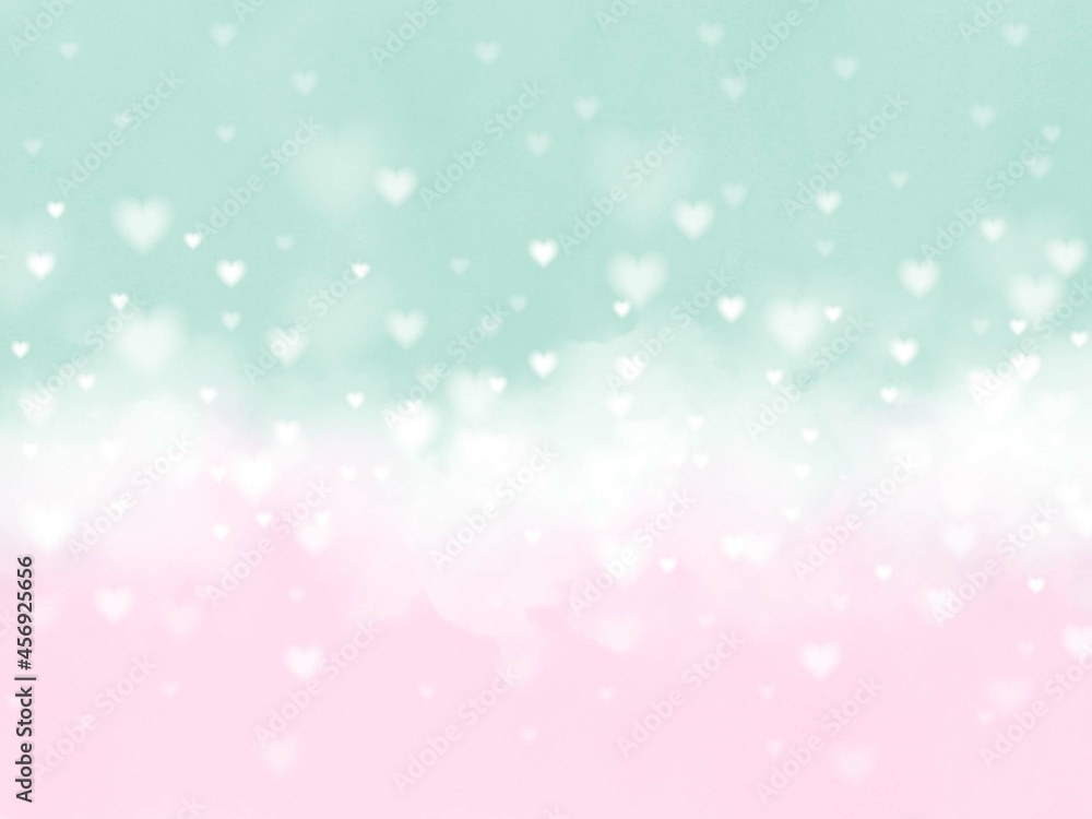 Pastel pink green cloudy heart snow bokeh background