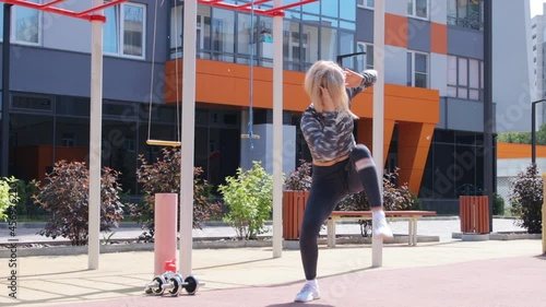 Woman's outdoor workout in summer  photo