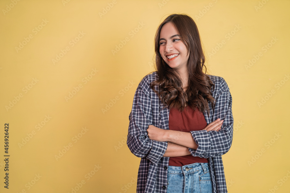 beautiful girl with a toothy smile with folded hands with space beautiful girl with a toothy smile with folded hands with space