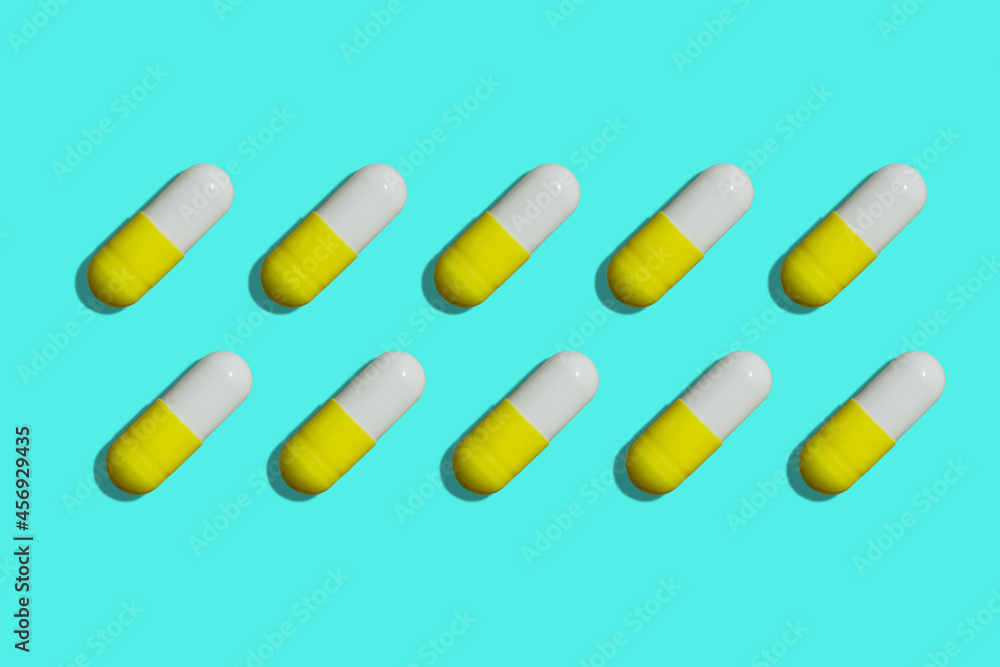 pills capsules pattern on bright background pills capsules pattern on bright background