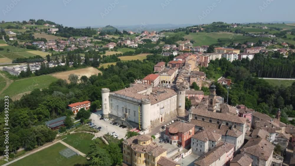 Costigliole D'Asti town and castle aerial view in Langhe, Roero, and Monferrato in Piedmont (Piemonte), Northern Italy. Famous Italian tourism destination Europe. Unesco World Heritage site. Vineyards Costigliole D'Asti town and castle aerial view in Langhe, Roero, and Monferrato in Piedmont (Piemonte), Northern Italy. Famous Italian tourism destination Europe. Unesco World Heritage site. Vineyards