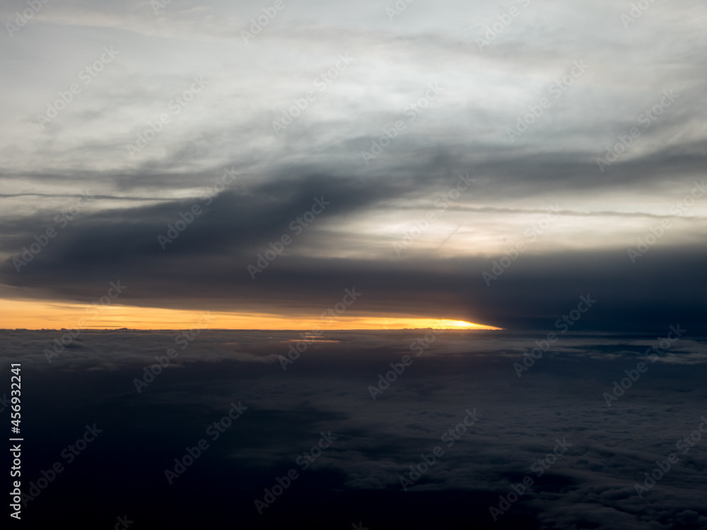 Sunrise view to sky and clouds from high altitude