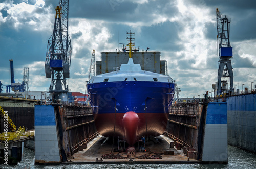 Container ship in dry dock photo