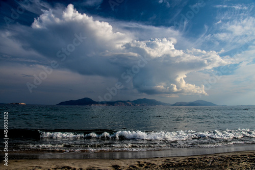 Clouds over beach and sea