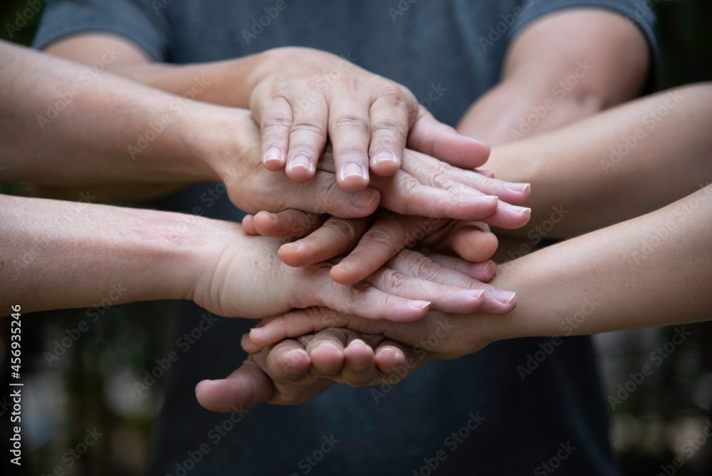 People join hands together for cooperation more power to teamwork,partnership and collaboration .to drive business goal achievement,copy space,selective focus. People join hands together for cooperation more power to teamwork,partnership and collaboration .to drive business goal achievement,copy space,selective focus.