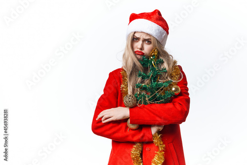 woman dressed as santa christmas tree decoration holiday
