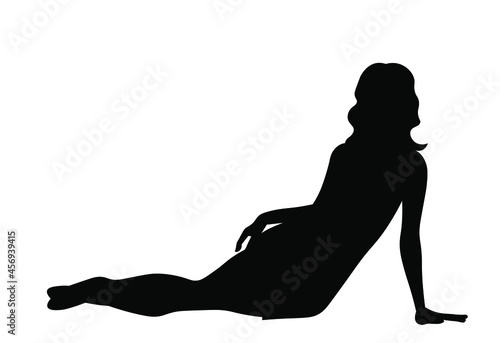 Beautiful woman lying or sitting silhouette vector illustration