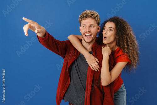 Young white couple hugging and laughing together