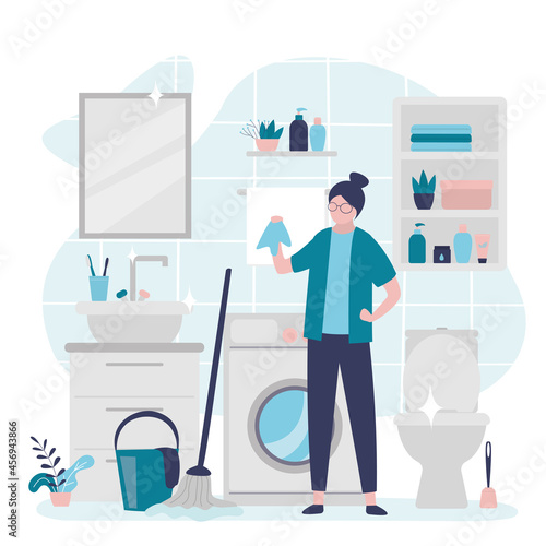 Housemaid mopping floors in restroom. Girl with rag washed furniture to shine. Lavatory interior design