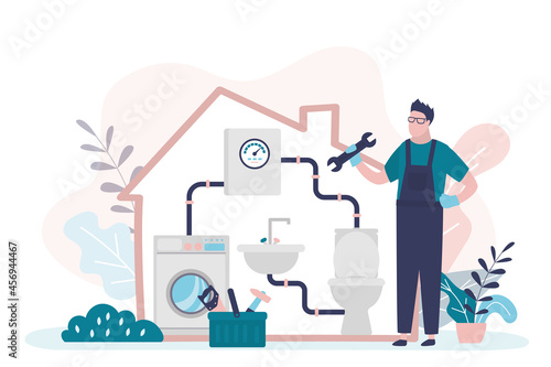 Specialist fixes plumbing in house. Plumber with different tools fixing pipes in toilet. Plumbing work