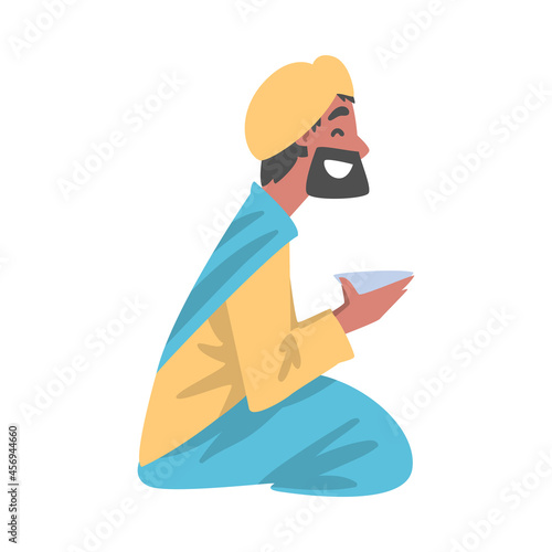 Indian Man Character in Turban Sitting on the Floor with Bowl Having Meal Vector Illustration