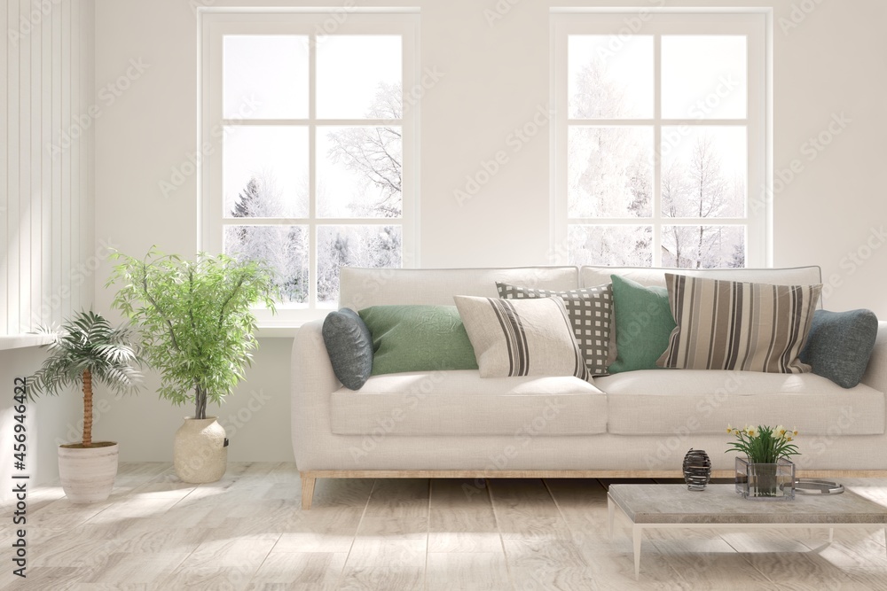 Fototapeta premium White living room with sofa and winter landscape in window. Scandinavian interior design. 3D illustration