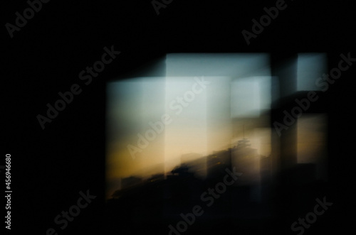 Canvastavla abstract sunset window in the dark room