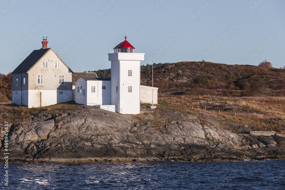 Terningen Lighthouse. White tower with red top
