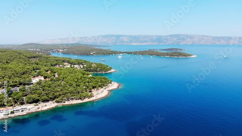 Drone shot on boat trips to the nearby Paklinsky Islands. Secluded beaches and coves in Croatian island of Hvar. Dubovitsa, and lavender fields frame from drone. Drone shot on Croatian island