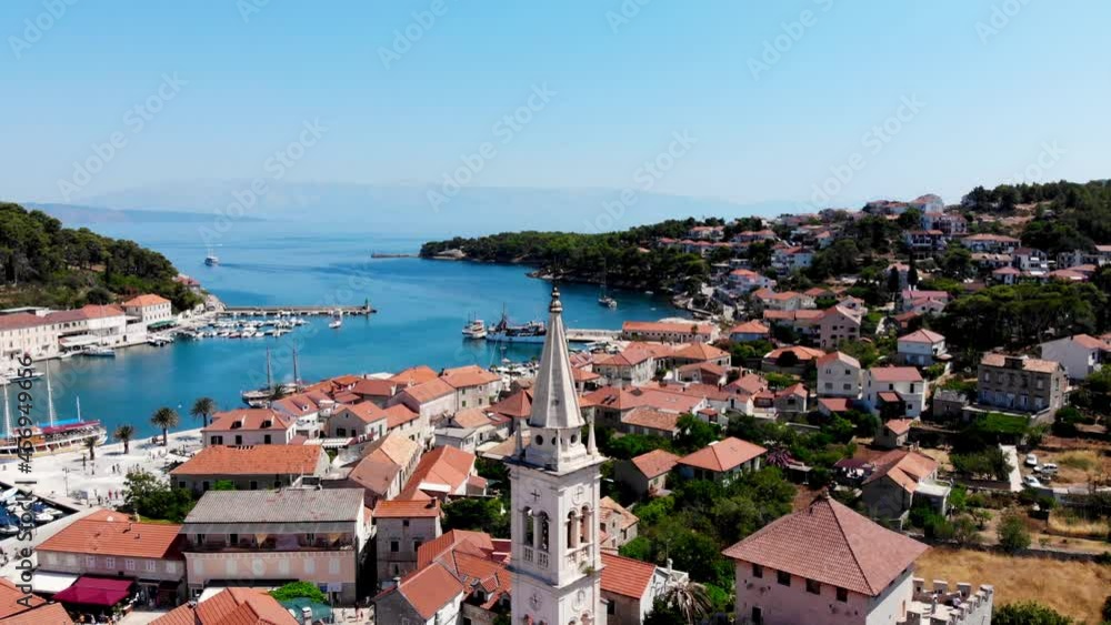 Drone shot on the Croatian resort island of Hvar in the Adriatic Sea. View from the drone to the port. Mountains on the island of Hvar. St. Stephen's Cathedral. Catholic Cathedral in the town of Hvar Drone shot on the Croatian resort island of Hvar in the Adriatic Sea. View from the drone to the port. Mountains on the island of Hvar. St. Stephen's Cathedral. Catholic Cathedral in the town of Hvar