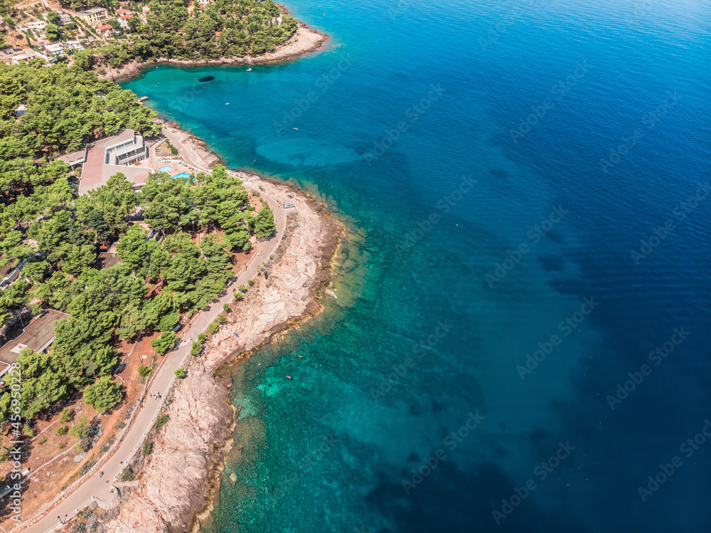 Drone shot on boat trips to the nearby Paklinsky Islands. Secluded beaches and coves in Croatian island of Hvar. Dubovitsa, and lavender fields frame from drone. Drone shot on Croatian island - obrazy, fototapety, plakaty 