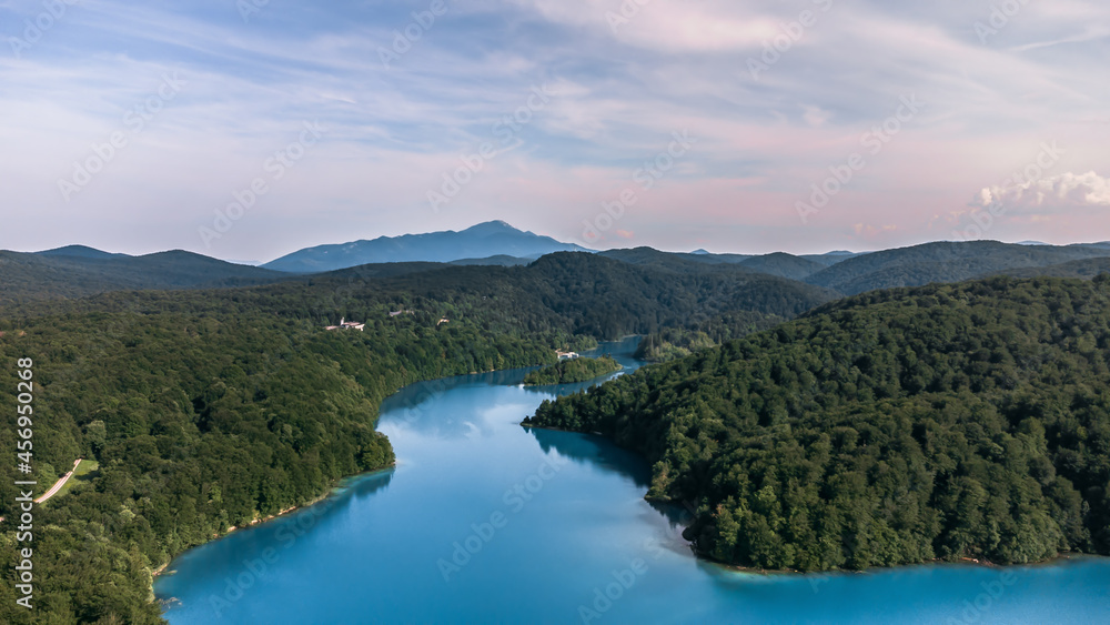 Drone shot Plitvice Lakes National Park in Croatia. Forest reserve in the central part of Croatia A lake connected by waterfalls and a limestone canyon. Hiking trails between lakes. A forest Drone shot Plitvice Lakes National Park in Croatia. Forest reserve in the central part of Croatia A lake connected by waterfalls and a limestone canyon. Hiking trails between lakes. A forest