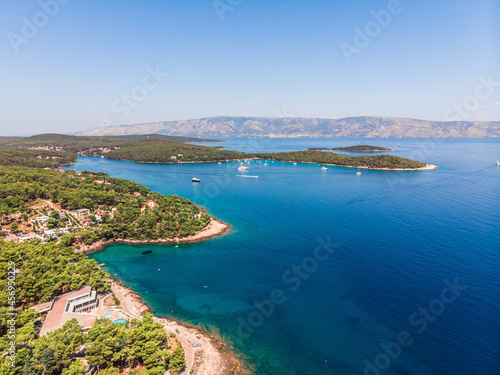 Drone shot on boat trips to the nearby Paklinsky Islands. Secluded beaches and coves in Croatian island of Hvar. Dubovitsa, and lavender fields frame from drone. Drone shot on Croatian island © Сергей Иванович