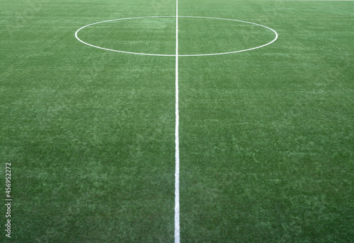 The geometric shapes drawn by the white lines of a football field. © aliberti