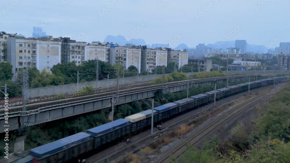 Liuzhou-Nanning Intercity Railway tracks at Nanning East Station. View of passing trains in Nanning, China. Chinese Railways. Liuzhou-Nanning Intercity Railway tracks at Nanning East Station. View of passing trains in Nanning, China. Chinese Railways.
