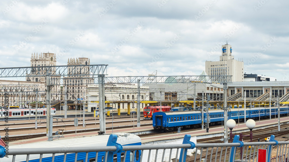 View of city industrial area with railway hub. Freight trains for cargo transportation.