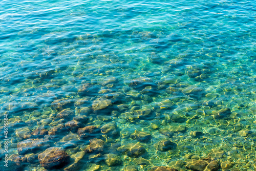 Mediterranean Sea in Turkey. View of the water and stones.