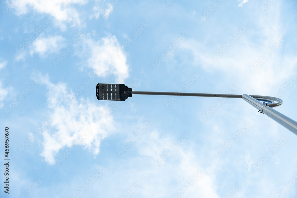 The city street lights are under the blue sky. The city street lights are under the blue sky.